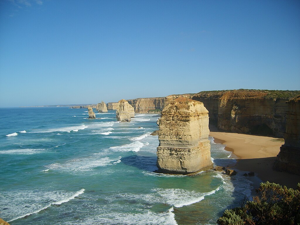 A photo of the 12 apostles rising from the water in Victoria, Australia on the Great Ocean Walk.