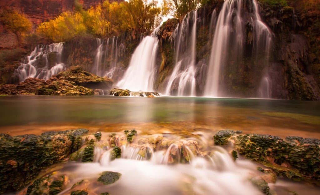 Havasu Falls is an oasis within the Grand Canyon. This image shows the swimming holes and red rocks surrounding the falls.