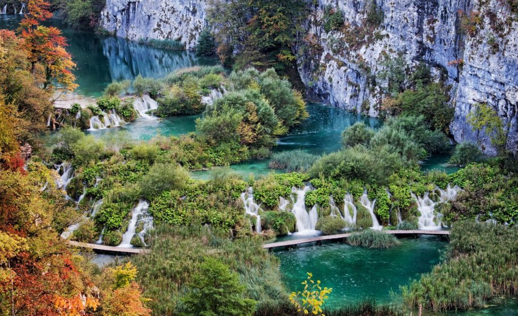 The stunning 16 lakes and falls of Plitvice Lakes National Park with a boardwalk that winds through the forests of Croatia.